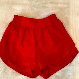 LULULEMON. Red hotty hots  like new. Worn 2 times.  Size 0.   Smoke free home.